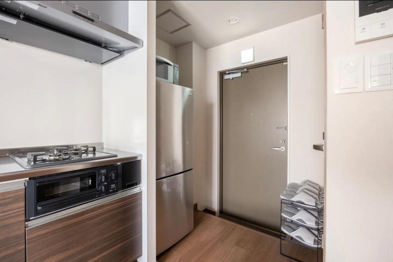 上野駅徒歩５分シングルベッド４台＋布団２セット1Ldk Appartement Tokio Buitenkant foto