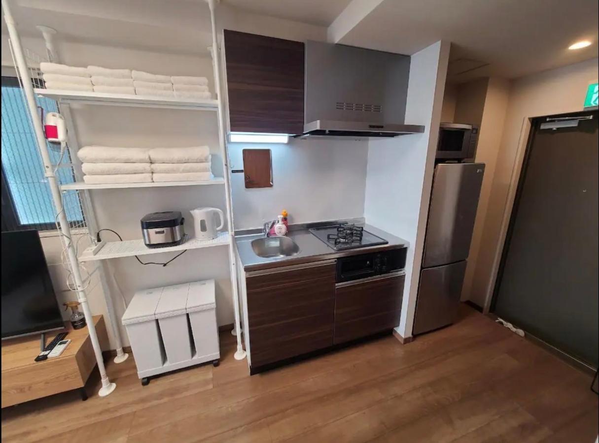 上野駅徒歩５分シングルベッド４台＋布団２セット1Ldk Appartement Tokio Buitenkant foto